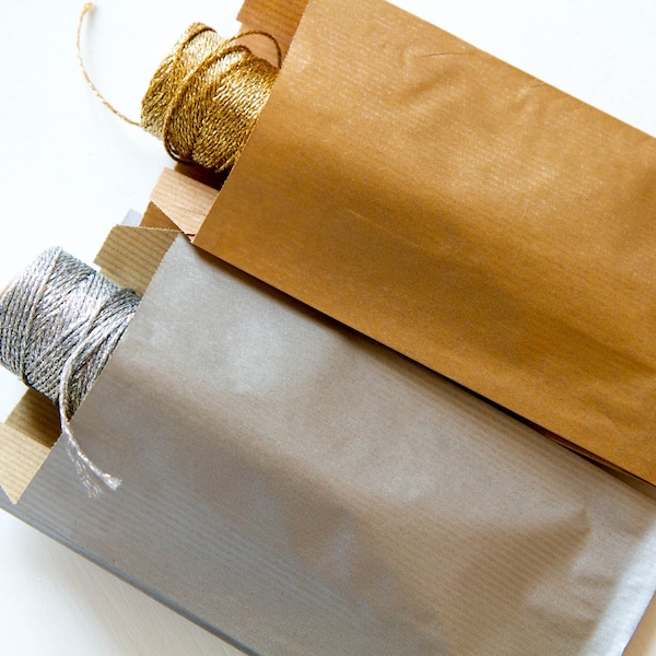 Gold or silver gusseted kraft bags for Xmas gifts