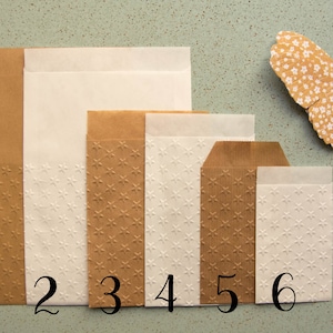 Sacchetti regalo con stella in rilievo, sacchetti per Natale, matrimonio, battesimo. Set da 10 tra cui scegliere