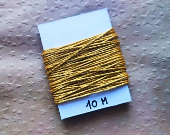 Golden string length 10m.