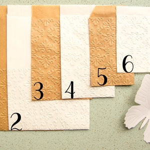 Sachets cadeau motif baroque pour mariage, dragées