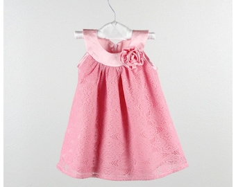 Pink Lace yoked Dress with matching pink satin yoke and Flower