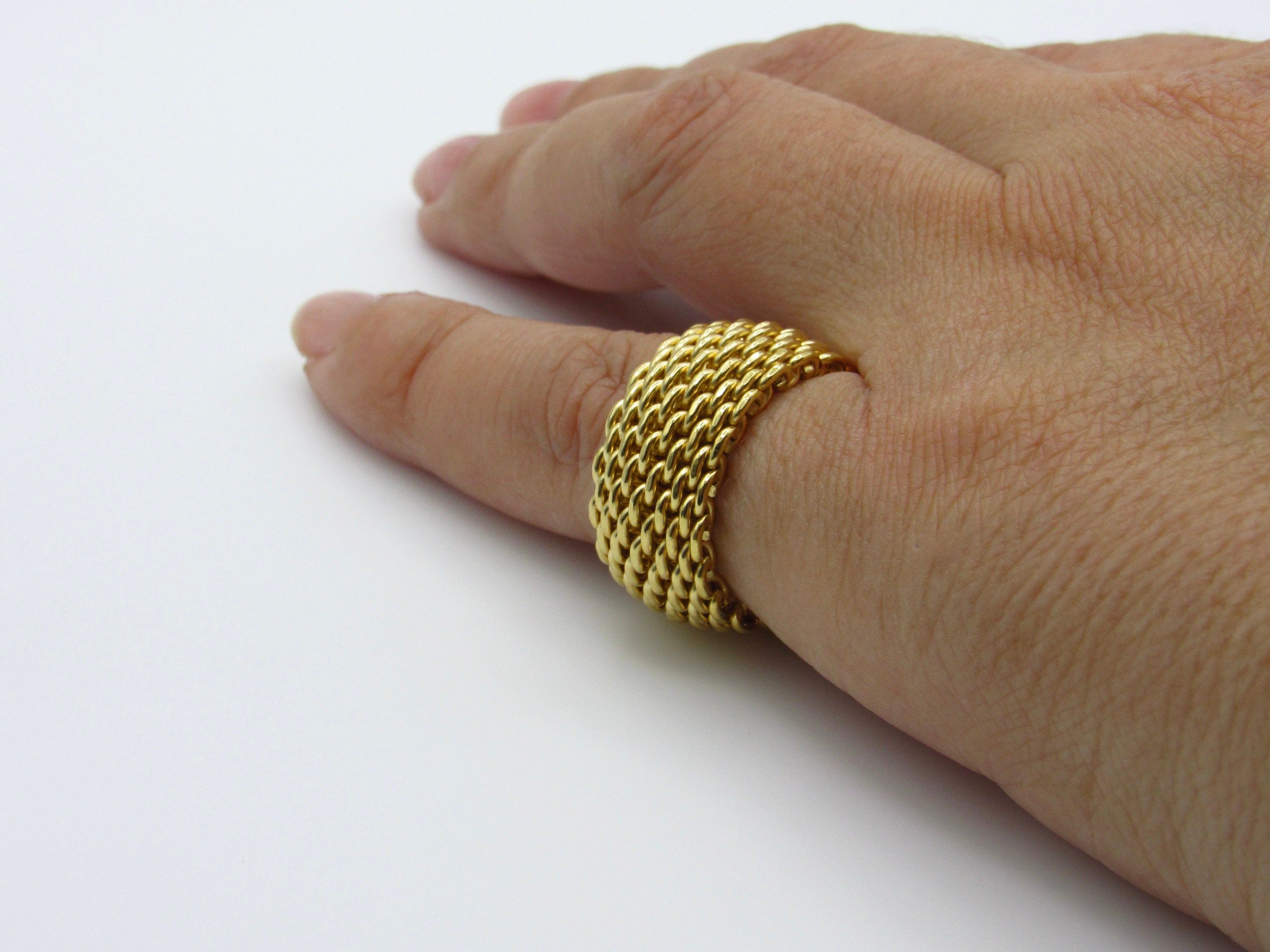 Sold at Auction: TIFFANY & CO EIGHTEEN KARAT GOLD MESH RING