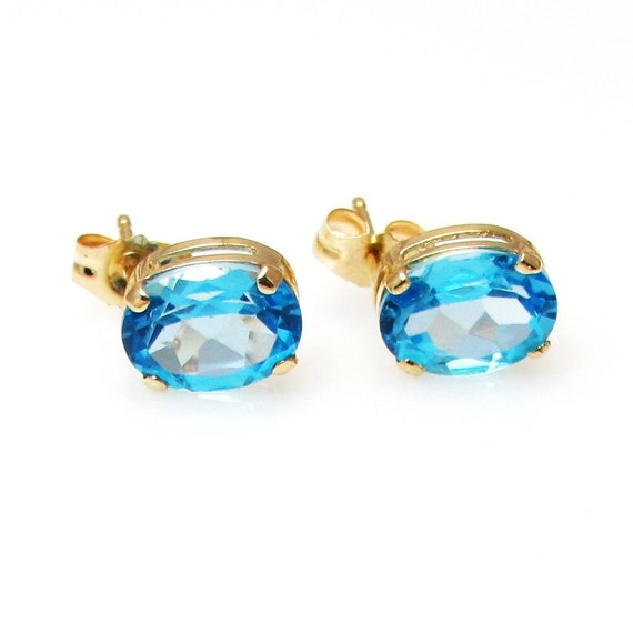 14K Yellow Gold Blue Topaz Stud Earrings - Oval B… - image 1