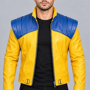 May include: A yellow leather jacket featuring a high collar, a central silver zipper, and blue shoulder panels with ribbed detailing. The jacket includes adjustable side buckles at the waist and long sleeves, worn over a plain black t-shirt.