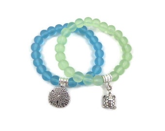 Glass Stretch bracelets with turtle or sand dollar charm; beach bracelets