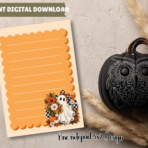 May include: A rectangular notepad page with a scalloped orange border and horizontal lines. The bottom corner features a white ghost illustration with a plaid bow, surrounded by sunflowers, daisies, and pumpkins. Text reads: INSTANT DIGITAL DOWNLOAD and One notepad 5x7 Design.