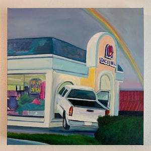 May include: A painting of a Taco Bell restaurant with a white pickup truck pulling into the drive-thru. A rainbow is in the sky above the building. The sign reads "Taco Bell".