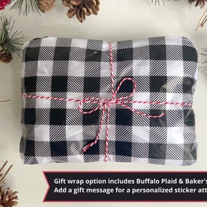 The DottieQ Modern Muff can be wrapped in black and white Buffalo Plaid tissue paper and red and white baker's twine. For an additional fee you can add a gift message attached to a tag on the package.