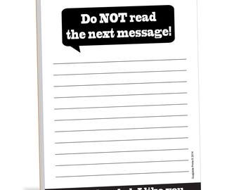 May include: A white notepad with black lines and a black speech bubble at the top that says "Do NOT read the next message!"  The bottom of the notepad has a black bar with the text "You little rebel, I like you."