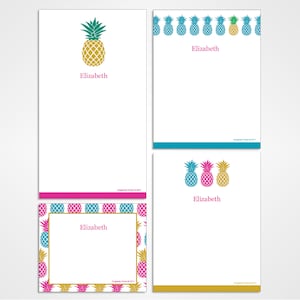 May include: Four different designs of personalized stationery featuring a pineapple motif. The stationery is white with a blue, pink, or gold border. The name "Elizabeth" is printed on each sheet.