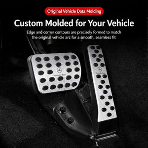 Puede incluir: Cubiertas de metal plateado para el pedal de freno y acelerador de un vehículo, con inserciones de agarre de goma negra y el logotipo de Mercedes-Benz. El texto dice: Original Vehicle Data Molding, Custom Molded for Your Vehicle, Edge and corner contours are precisely formed to match the original vehicle arc for a smooth, seamless fit.