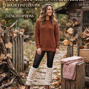 May include: Chunky leg warmers crochet pattern PDF with 2 length options. The image displays cream-colored cable knit leg warmers worn over black leggings, paired with brown boots, a rust-colored sweater, and a folded pink crochet piece.