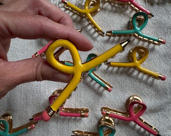 Pinza metálica para lápiz, tamaño mediano