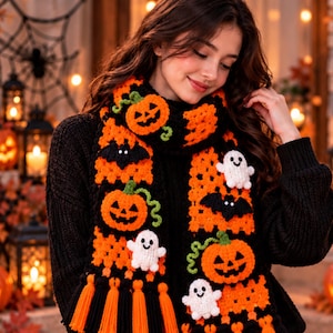 May include: A crochet scarf featuring a repeating pattern of orange and black squares adorned with appliqués of orange jack-o'-lanterns with green stems, black bats, and white ghosts. The scarf ends with alternating orange and black yarn tassels.