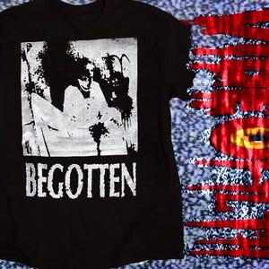 May include: A black short-sleeve t-shirt featuring a white square graphic of a figure and the text BEGOTTEN. To the right, a vertical red graphic with a yellow eye design and the text VIDEODROME appears to be melting or dripping downward.
