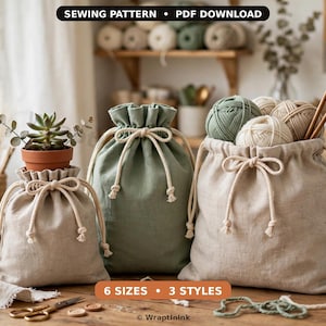 May include: A sewing pattern PDF download for three drawstring bags in 6 sizes and 3 styles. The bags are made of light beige and sage green fabric with white rope drawstrings. One bag holds a succulent, another holds yarn and knitting needles.