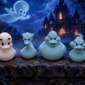 May include: A set of four rubber ducks featuring character designs inspired by Casper the Friendly Ghost. One duck is white with a friendly expression, while the other three are light blue with mischievous, frowning facial expressions.