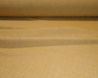 Gold solid light weight fabric good for drapery. 24 per yard. 54" wide.