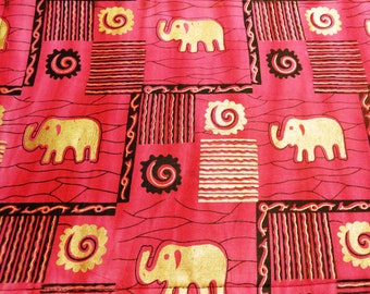 3 reversible table placement for the kids.13"x18"."Global Elephants" Pink .gold color.