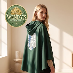 May include: A dark green hooded cloak featuring a white and blue wing emblem on the back. The garment includes a hood and a smooth fabric texture. A circular logo in the upper left corner displays the text Wendy's Cosplay Wares in gold lettering.