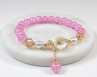 Pink Beaded Bracelet with White Magnolia Flower