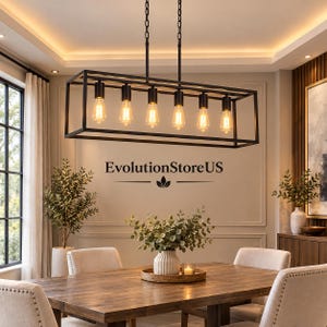 May include: A rectangular black metal chandelier featuring six exposed Edison-style light bulbs suspended from a frame. The fixture hangs by two chains and includes the text EvolutionStoreUS printed on the wall behind the light.