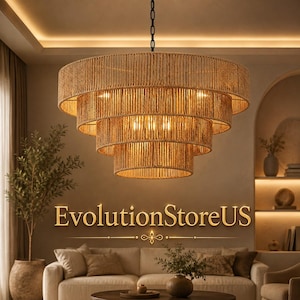 May include: A tiered chandelier featuring four concentric circular frames wrapped in natural tan rope. The fixture hangs from a black chain and emits a warm, golden glow from internal light sources. The text EvolutionStoreUS is centered below.
