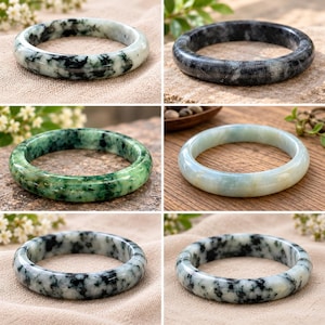 May include: A collection of six smooth, circular stone bangles. The bracelets feature various patterns, including mottled white and black, solid dark charcoal, vibrant green with dark inclusions, and a pale, translucent light green.