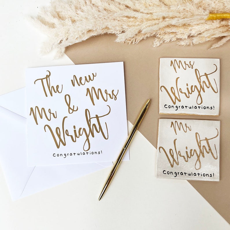 White square card with gold text: The new Mr & Mrs NAME congratulations!
Matching white square coasters with gold text: Mrs NAME congratulations.
Matching white square coasters with gold text: Mr NAME congratulations.