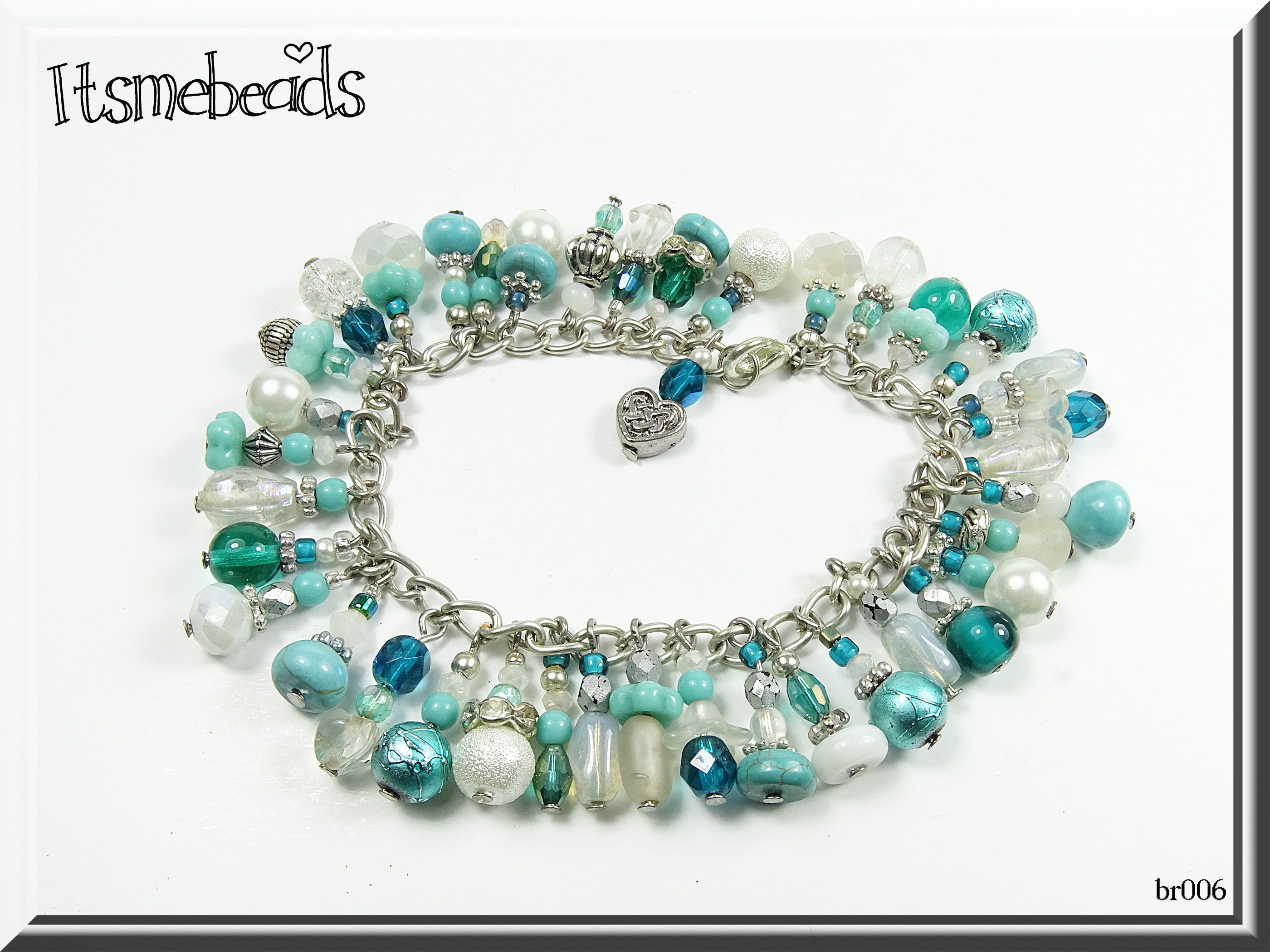 Charm bracelet, beads of imitated turquoise & silver