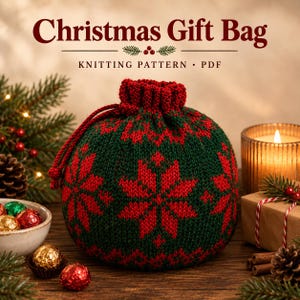 May include: A round, knitted drawstring gift bag featuring a dark green base with a red snowflake pattern. The bag has a cinched top with a red cord. Text at the top reads: Christmas Gift Bag KNITTING PATTERN • PDF.