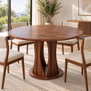 May include: A round dining table with a dark brown wood grain finish and a sculptural pedestal base, surrounded by four chairs featuring dark brown wooden frames and light beige upholstered seats, arranged in a symmetrical circular formation.