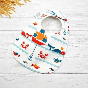 Organic baby bib, Baby Bib, Organic cotton fleece, GOTS, sailing, Nautical baby, whales, boats, crabs, fish, fits 3 months to 2 years plus image 1