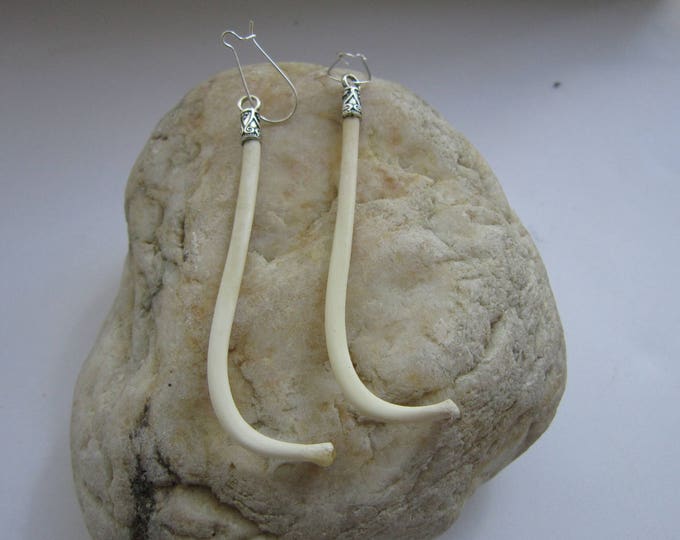 Raccoon Penis Bone Earrings Dangle The Love Bone Boho Jewelry Burning raccoon-penis-bone-earrings-dangle-the-love-bone-boho-jewelry-burning