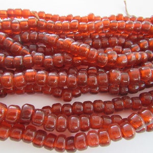 Glass Crow Pony Beads 9mm x 6mm TRANSLUCENT REDDISH ORANGE 100 per strand Jewelry/Craft Projects