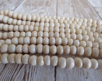 Cuentas de hueso de búfalo, cuentas redondas de color blanco roto, cuentas tribales para joyería, suministros para manualidades