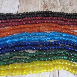 Cuentas de poni de cuervo de vidrio translúcido de 9 mm x 6 mm, 100 unidades, para proyectos de joyería y manualidades. Elige el color.