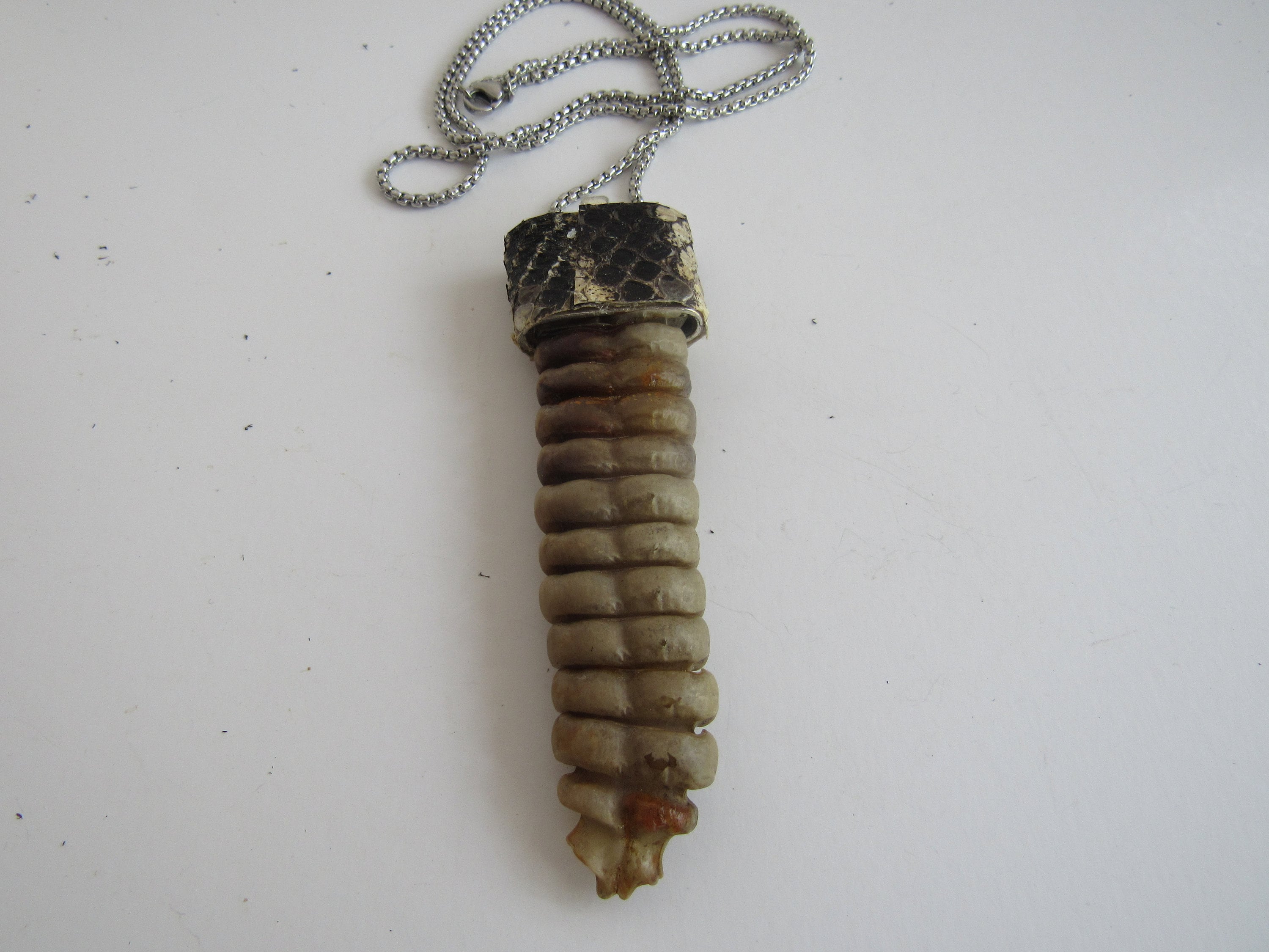I made a rattlesnake tail pendant which is moveable. : r/somethingimade