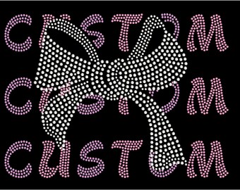 May include: A rhinestone design featuring the word "CUSTOM" three times in a white and pink color scheme. The word "CUSTOM" is spelled out in rhinestones with a large bow design in the center.