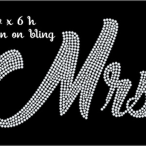 May include: Iron-on bling design that reads "Mrs." in white rhinestones. The design is 10 inches wide and 6 inches high.