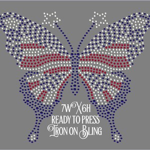 May include: A butterfly-shaped iron-on transfer made of red, white, and blue rhinestones on a gray background. The design includes the text 7W X 6H READY TO PRESS IRON ON BLING. The butterfly features two star-shaped antennae at the top.