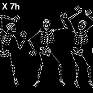 May include: Three white skeleton figures dancing, made of rhinestones, with the text "10w X 7h" and "ready to press iron on Bling!"
