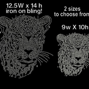May include: Two iron-on rhinestone designs of a tiger face. The larger design is 12.5 inches wide by 14 inches high. The smaller design is 9 inches wide by 10 inches high.
