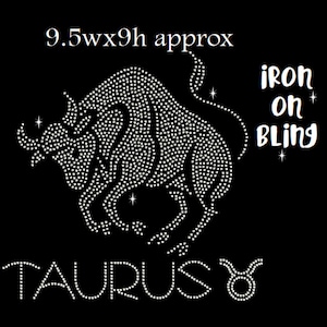 May include: Iron-on rhinestone design of the Taurus zodiac sign, approximately 9.5 inches wide by 9 inches high. The design features a bull with the word "Taurus" and the Taurus symbol below it. The text "iron on bling" is also included.