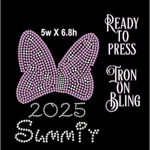 May include: A pink and white rhinestone iron-on design featuring a bow, the text "2025 Summer", and the words "Ready to Press Iron On Bling". The design measures 5 inches wide by 6.8 inches high.