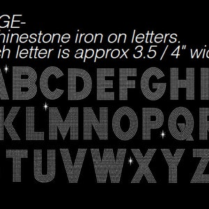 May include: A set of 26 iron-on rhinestone letters, each approximately 3.5 to 4 inches wide. The letters are in uppercase and are arranged in alphabetical order.  HUGE- 5" rhinestone iron on letters. Each letter is approx 3.5 / 4" wide