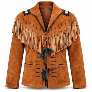 May include: A tan suede jacket featuring long fringe across the chest and shoulders, black leather lacing details, and decorative wooden toggles. The shoulders are accented with black and white patterned patches, and the front closes with dark ties.