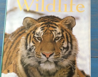 Vintage book. The encyclopedia world wildlife. Colorful art Book, animal art book, coffee table book.