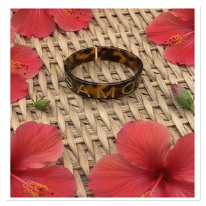 TS acrylic faux tortoise shell design polynesian bangle cuff Samoa Hawaii bracelet approx. 3/4 inch wide. All sales final
