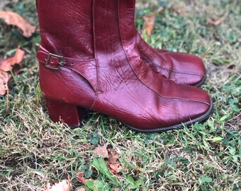 etienne aigner riding boots with stamped logo